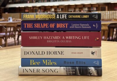 Photograph of the books shortlisted for the 2024 National Biography Award stacked in a pile
