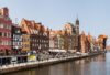 Photo of ols building fronting the river in Gdansk, Poland