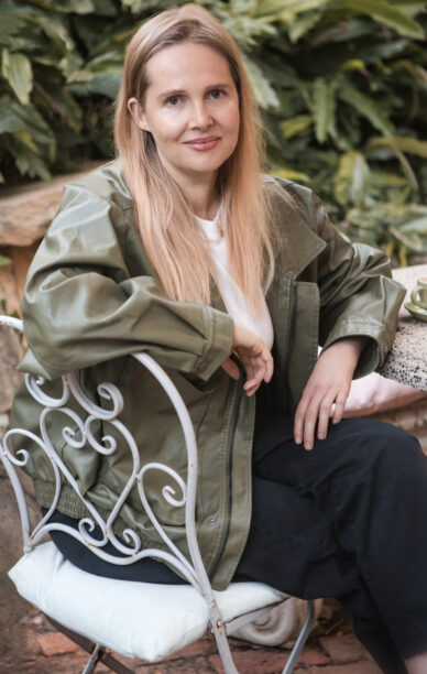Photo of Hannah Goldstein sitting on a chair