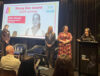Photo of Alisa Ahmed accepting award